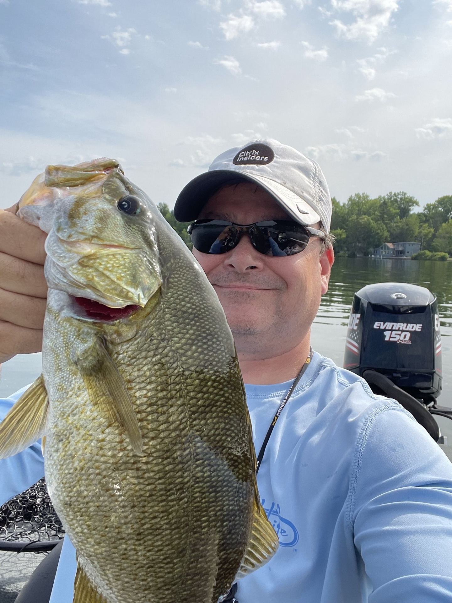 BassFishingTips.net Handsome Man holding giant small mouth bass