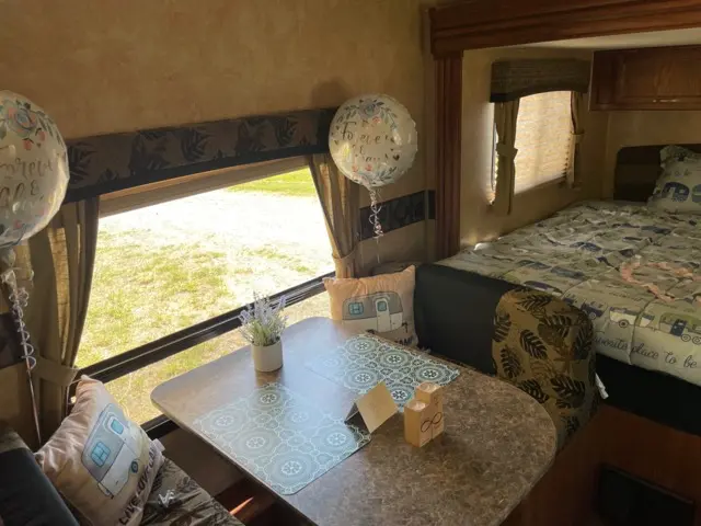 Blue Jay Getaway setup interior table with flowers