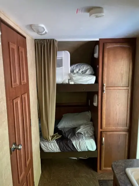 Double bunk fun set up of RV Rental trailer Blue Jay Getaway located at Kindlewood Camping in the Berkshires of Western Massachusetts