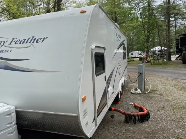 Outside Shower of RV Rental trailer Blue Jay Getaway located at Kindlewood Camping in the Berkshires of Western Massachusetts