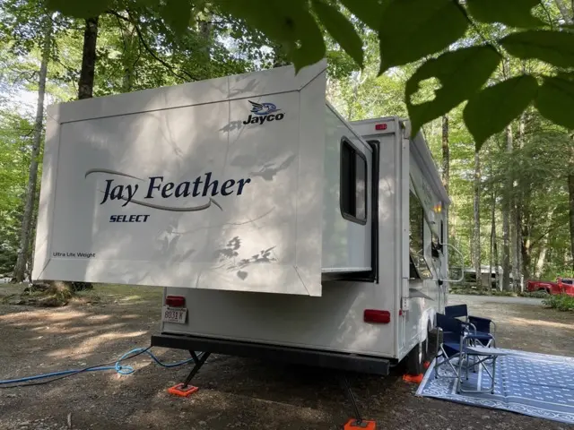 Clean Jay Feather set up of RV Rental trailer Blue Jay Getaway located at Kindlewood Camping in the Berkshires of Western Massachusetts