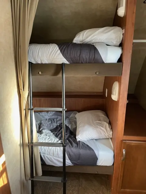 Fun Bunks of RV Rental trailer Blue Jay Getaway located at Kindlewood Camping in the Berkshires of Western Massachusetts